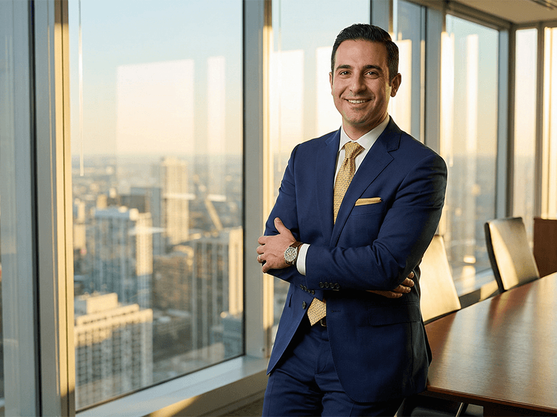 Founder of Virtu Venture Group in a modern high-rise office